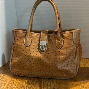 Dooney and Burke Stritch embossed bag with Dooney charm 8 x 12 x 5 1/2